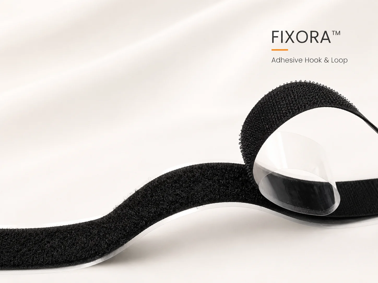 Fixora adhesive hook and loop tape for medical device mounting